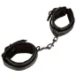 Preview: Black, padded faux leather handcuffs connected by a short chain with carabiner hooks.
