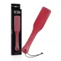 Preview: Red leather paddle with packaging, inscription "Fetish Submissive".