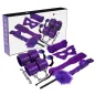 Preview: Lila Bondage-Set mit Augenmaske, Fesseln, Seil, Ballknebel und Federkitzler vor Verpackung.