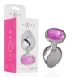 Preview: Silver anal plug with pink crystal, packaging in the background, brand "intense", size M.