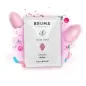 Preview: Kosmetikverpackung von Bruma mit Aloe Vera, umgeben von rosa Zuckerwatte und bunten Süßigkeiten.