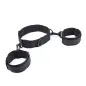 Preview: Black fabric handcuffs and leg irons with adjustable straps and metal rings on a white background.