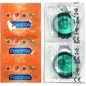 Preview: Zwei Pasante-Kondomverpackungen: links orange mit Fruchtmotiven, rechts transparent mit grünem Kondom sichtbar.