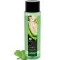 Preview: Green bottle containing Shunga shower gel, decorated with Asian art, next to it fresh mint leaves.