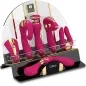 Preview: Various pink and gold massage devices on a black stand with a mesh back, brand name "Shunga" visible.