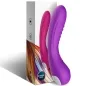 Preview: Purple and pink silicone vibrator in front of packaging with a colorful design and the inscription "Silicone Toys".