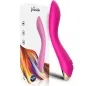 Preview: Pink vibrator with a curved shape in front of packaging with a colorful design.