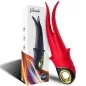 Preview: Roter Vibrator mit goldenen Akzenten neben Verpackung mit buntem Design und der Aufschrift "Silicone Toys".