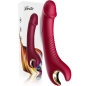 Preview: Roter Vibrator mit goldenen Akzenten, präsentiert vor einer Verpackung mit buntem Design.