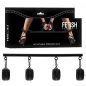 Preview: Packaging of an adjustable spreader bar with hand and foot cuffs, shown with high heels.