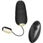 Preview: Black, egg-shaped massage device with paw print pattern and remote control, gold accents.