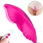 Preview: Pink vibrator with remote control, shown in use under lace.