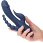Preview: Hand hält blauen Vibrator mit mehreren Armen und wellenförmigem Design.