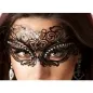Preview: Close-up of a woman wearing an elaborate black eye mask and sparkling earrings.