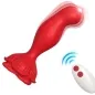 Preview: Red, fish-shaped massage device with a remote control that sends a radio signal.