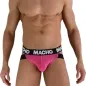 Preview: Mann in pinkem Jockstrap mit schwarzem Bund, auf dem "MACHO" steht.