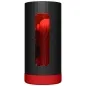 Preview: Black cylindrical device with a red accent and a transparent window revealing a red, textured interior.