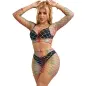 Preview: Woman in a colorful mesh dress over black underwear, posing with raised arms.