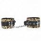 Preview: Leopard print handcuffs connected with black leather and chain.