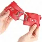 Preview: Feste Handgelenkfesseln Mit Ring Und Nieten Rot – Kink