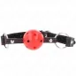 Preview: Red ball gag with black leather strap and metal rings, red stitching, on a white background.