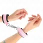 Preview: Verstellbare Neopren-Handhandfesseln Rosa – Kink