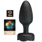 Preview: Black, textured massage device with color-changing light and on/off switch.