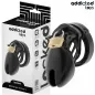 Preview: Black chastity device with padlock, packaging in the background, brand "Addicted Toys".