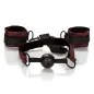 Preview: Black ball gag with red handcuffs on a white background.