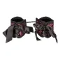 Preview: Red and black handcuffs with bows and chain, decoratively designed.