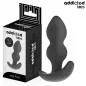 Preview: Black anal plug from Addicted Toys, 10.3 cm, next to the packaging with geometric pattern.