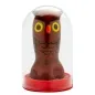 Preview: Brown owl figurine with yellow eyes and red beak in a transparent plastic case on a red base.