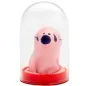 Preview: Rosa Schweinchenfigur mit lila Nase in einer durchsichtigen Kuppel auf rotem Sockel.