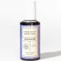 Preview: Purple room fragrance spray bottle with the inscription "Pheromone Room Spray, Love in Bloom, Lilac Dream, Eau de Toilette".