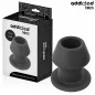 Preview: Schwarzer Analplug von Addicted Toys, 10,4 cm, neben der Verpackung mit geometrischem Muster.