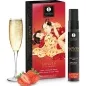 Preview: Verpackung und Flasche von Shunga Waves of Pleasure Spray, mit Glas Sekt und Erdbeeren.