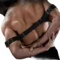 Preview: Muscular back with a black belt running over the shoulders, hands grasping the arm.