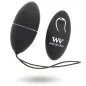 Preview: Black, egg-shaped vibrating device with remote control, brand "Womanvibe", on a white background.