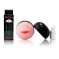 Preview: Erotic toy shaped like lips, with a black casing and a bottle of lubricant. Packaging in the background.