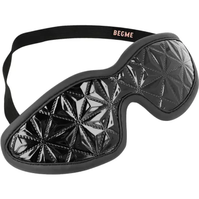 Black eye mask with geometric pattern and elastic band, inscription "BEGME".