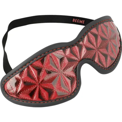 Red eye mask with geometric pattern and black elastic band, inscription "BEGME".
