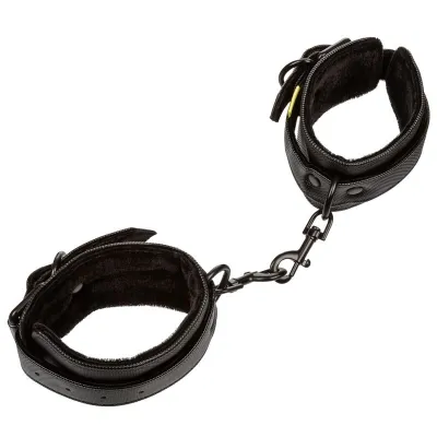 Black, padded faux leather handcuffs connected by a short chain with carabiner hooks.