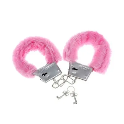 Pink plush handcuffs with two keys on a white background.