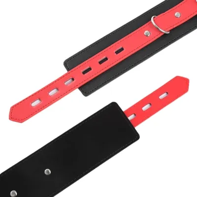 Black and red leather bracelet with buckles and holes.