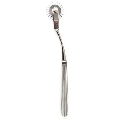 Metallic needle wheel with handle, used for neurological tests.