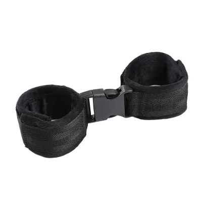 Black handcuffs with buckle closure on a white background.
