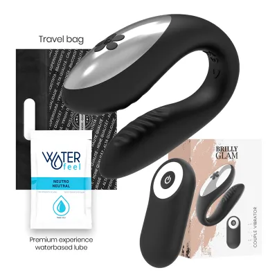 Black couples vibrator with remote control, lubricant and travel bag, packaging in the background.