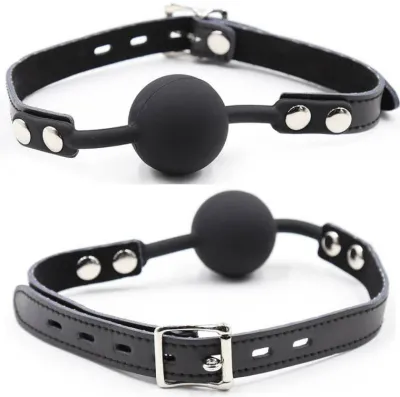 Black ball gag with adjustable leather strap and metal buckle, on a white background.