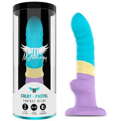 A colorful dildo in pastel shades, packaged in a transparent tube labeled "Mythology Colby - Pastel".