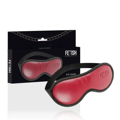 Red eye mask with a black border, packaged in a black box with a chain motif and the inscription "Fetish Submissive".